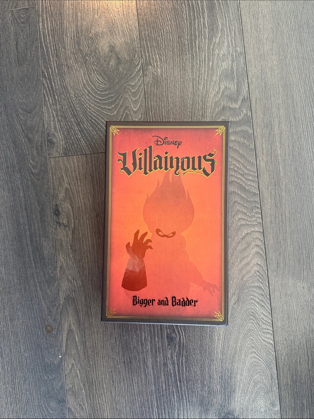 Disney Villainous Bigger and Badder Expansion — Red and Orange Cover